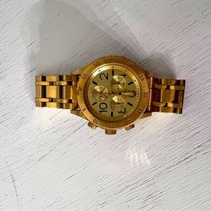 Nixon gold chronograph metal watch